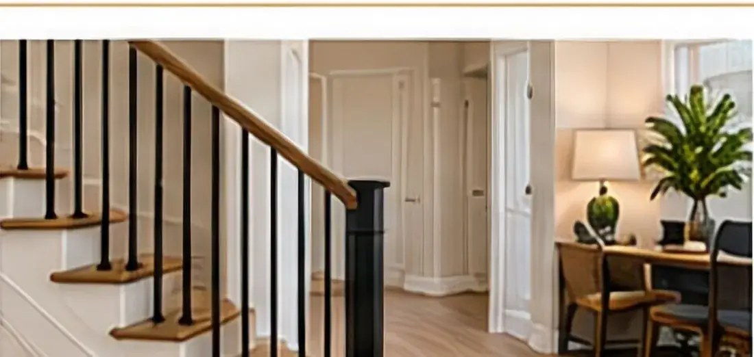 Stair with modern black balusters and oak treads